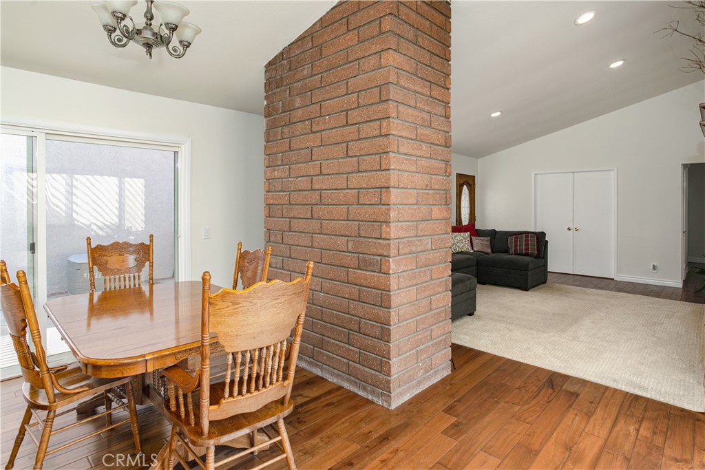 14302 Morning Glory Road Tustin, CA 92780 - Photo 9 of 38 a view of a dining room with furniture and wooden floor