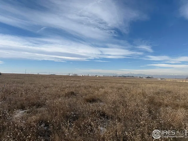 a view of an ocean and mountain