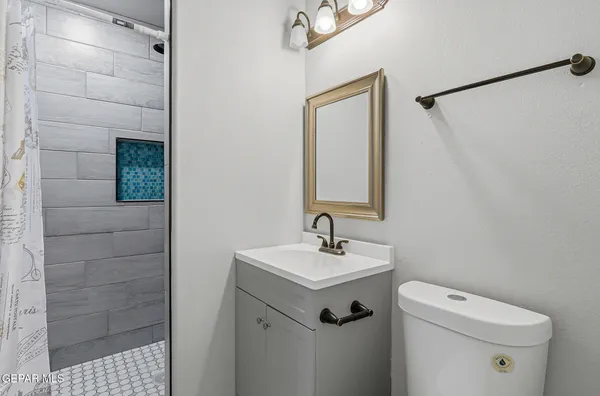 a view of storage and utility room with wooden floor