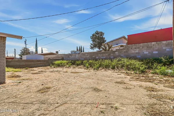 a view of a house with a snow on the road