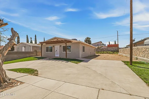 a view of a house with a street