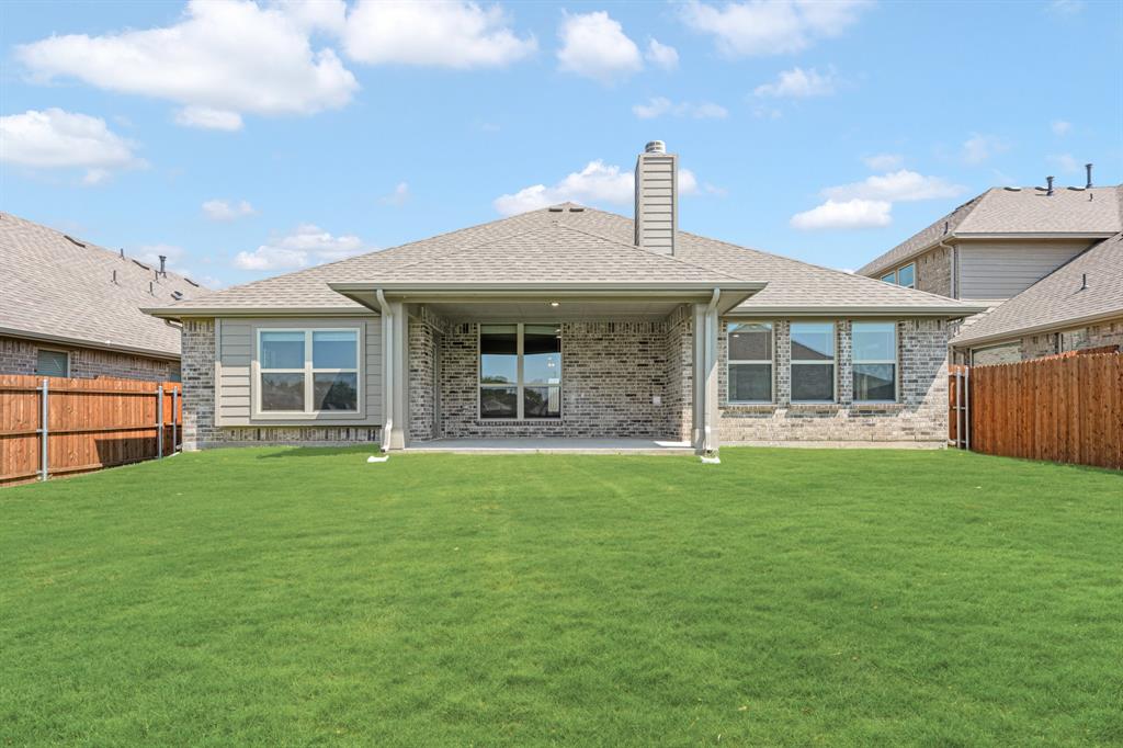 960 Imperial Eagle Road Alvarado, TX 76009 - Photo 38 of 40 a front view of a house with a garden