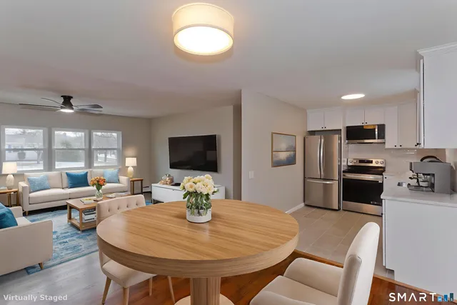 a view of kitchen with wooden floor