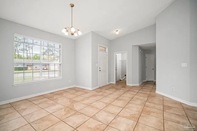 a view of an empty room with window