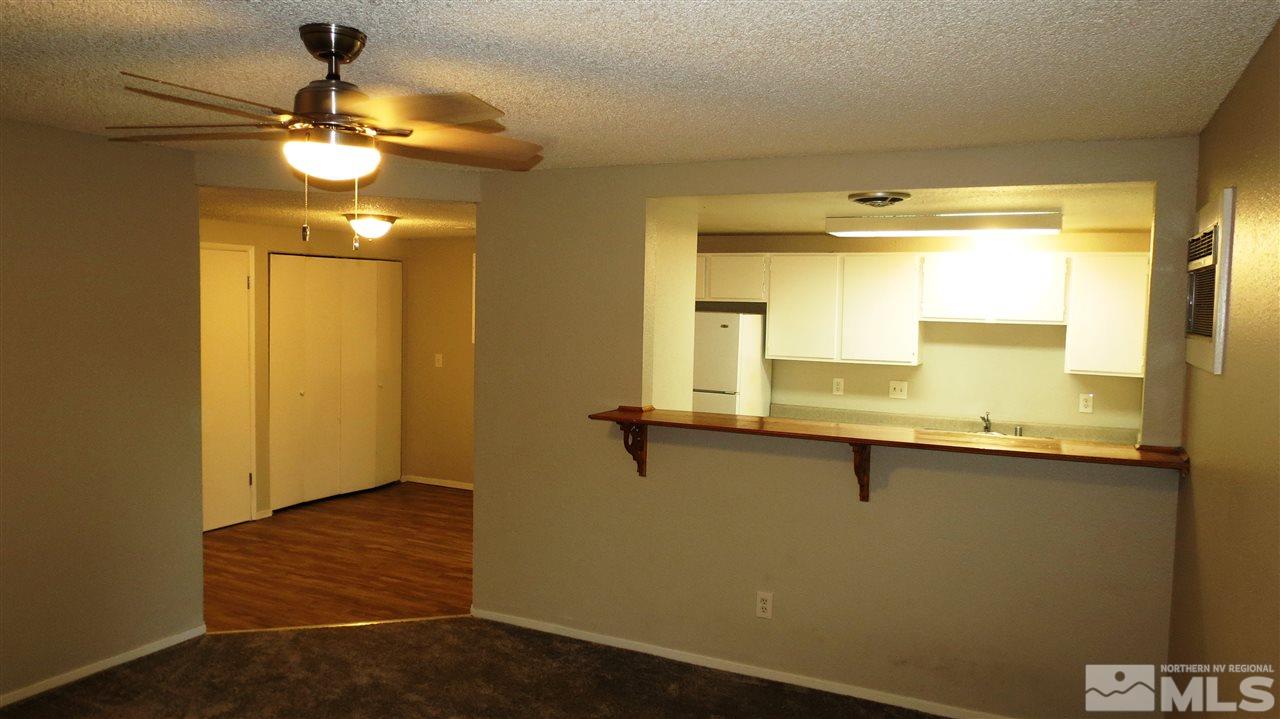 2015 Trainer Way Reno, NV 89512 - Photo 2 of 22 a bathroom with a sink and a mirror