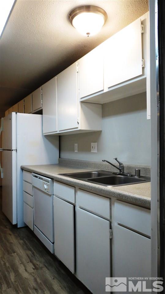2015 Trainer Way Reno, NV 89512 - Photo 9 of 22 a kitchen with stainless steel appliances a sink and a refrigerator
