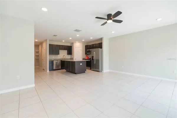 a view of kitchen and microwave