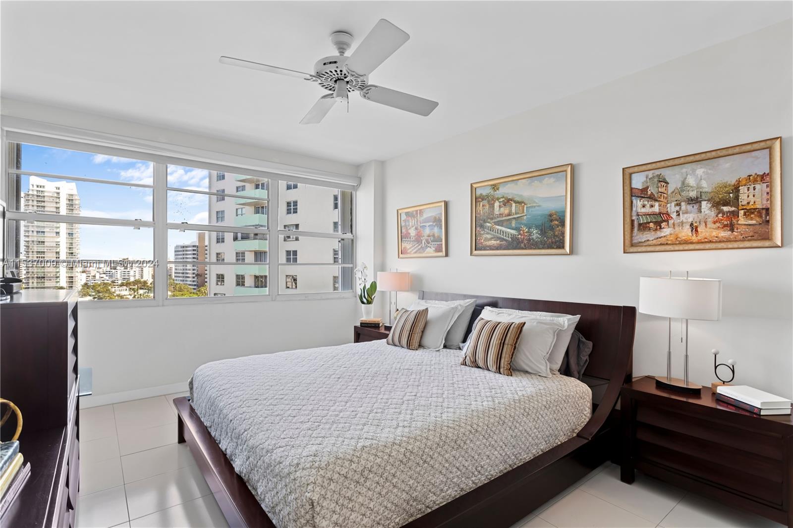 3 Island Avenue, Unit 10K Miami Beach, FL 33139 - Photo 10 of 19 a bedroom with a large bed and a window
