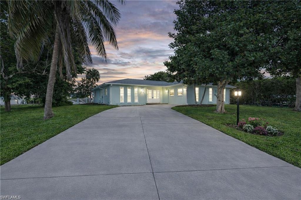 3461 Lakeview Drive Naples, FL 34112 - Photo 32 of 32 a view of backyard with green space