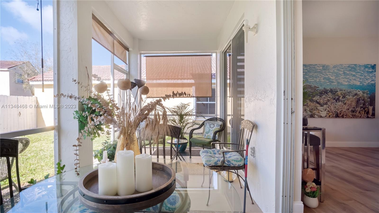 675 Falling Water Road Weston, FL 33326 - Photo 21 of 39 a view of a dining room with furniture window and wooden floor