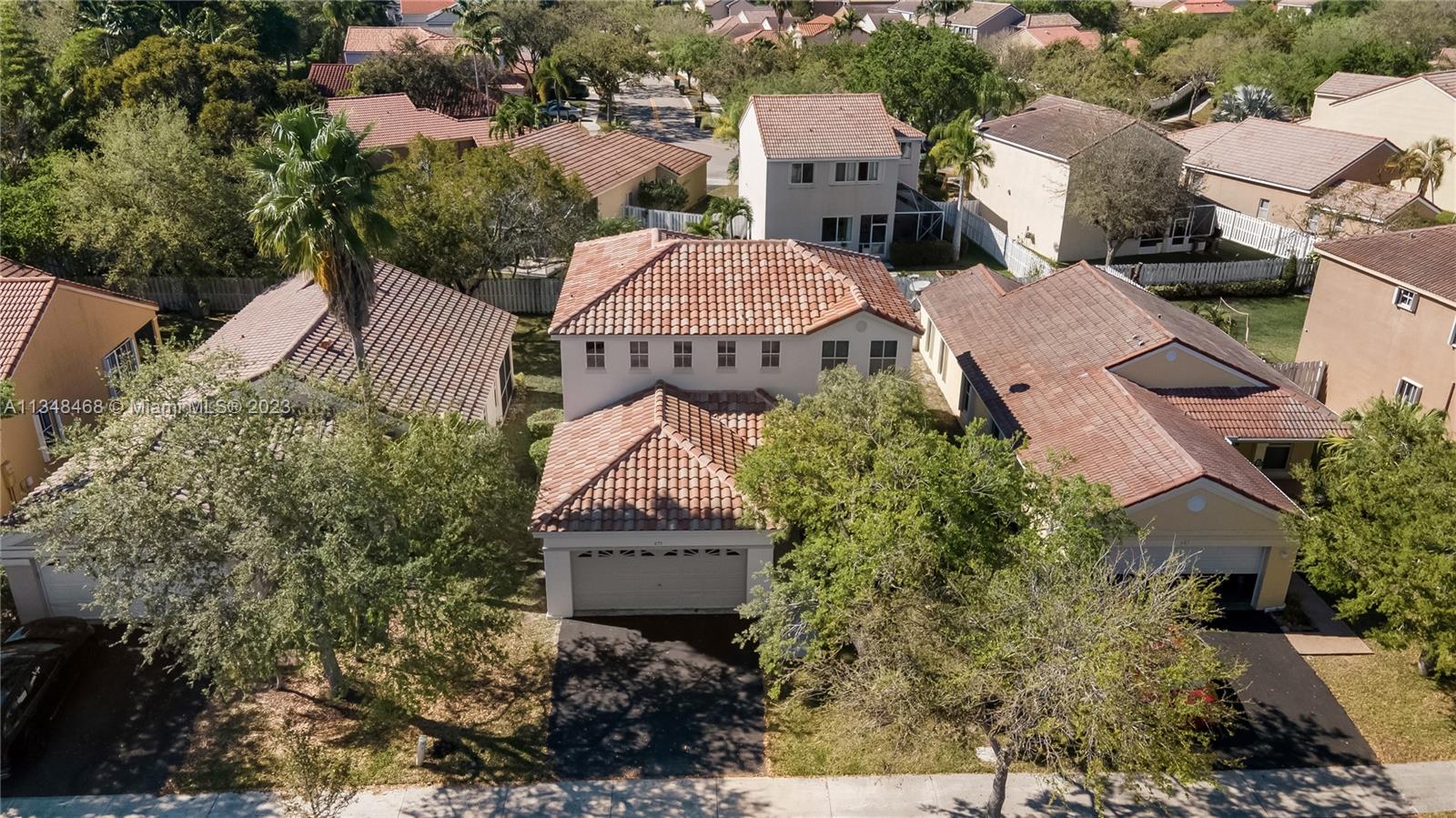 675 Falling Water Road Weston, FL 33326 - Photo 5 of 39 an aerial view of a house with yard swimming pool and outdoor seating