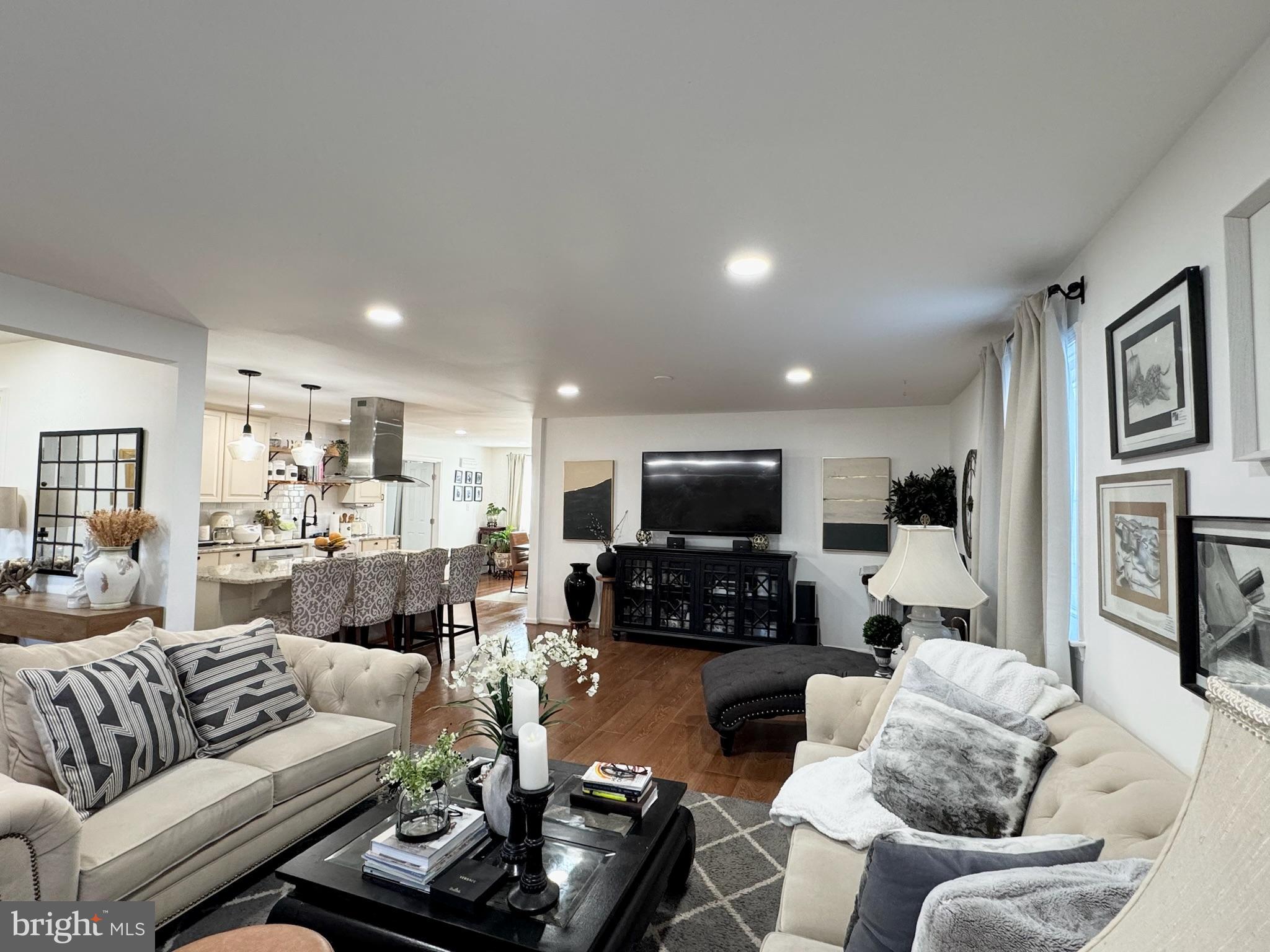 7397 New Cut Road Kingsville, MD 21087 - Photo 11 of 42 a living room with furniture and a flat screen tv