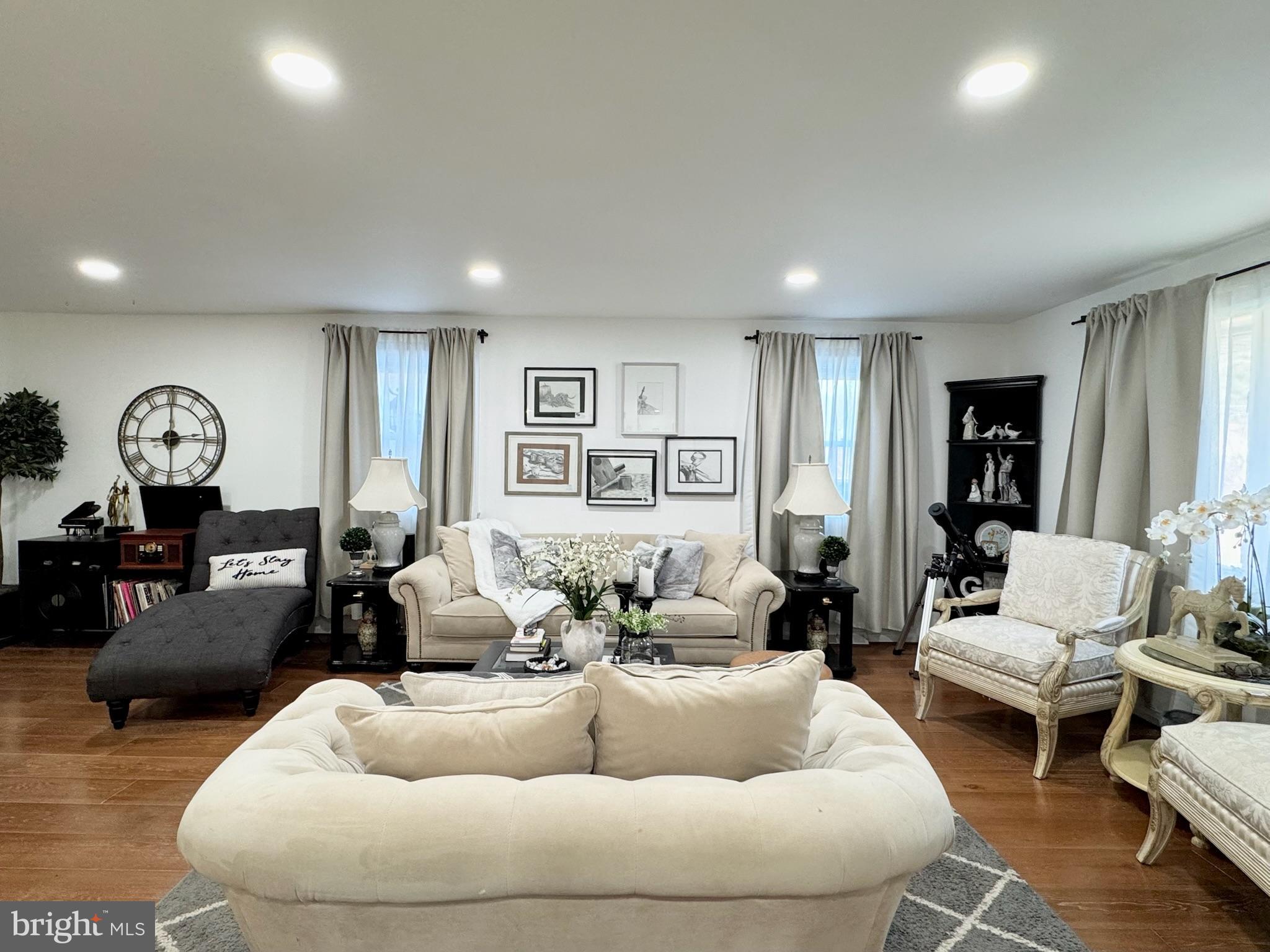 7397 New Cut Road Kingsville, MD 21087 - Photo 12 of 42 a living room with furniture and wooden floor