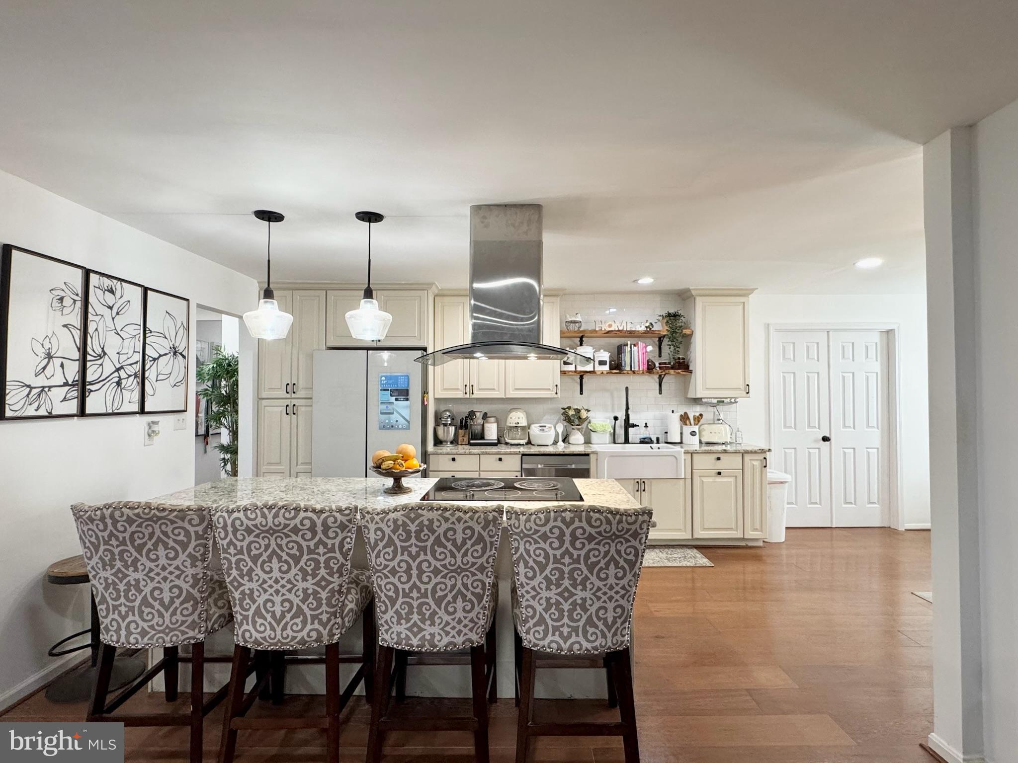 7397 New Cut Road Kingsville, MD 21087 - Photo 13 of 42 a dining table with chairs and kitchen view