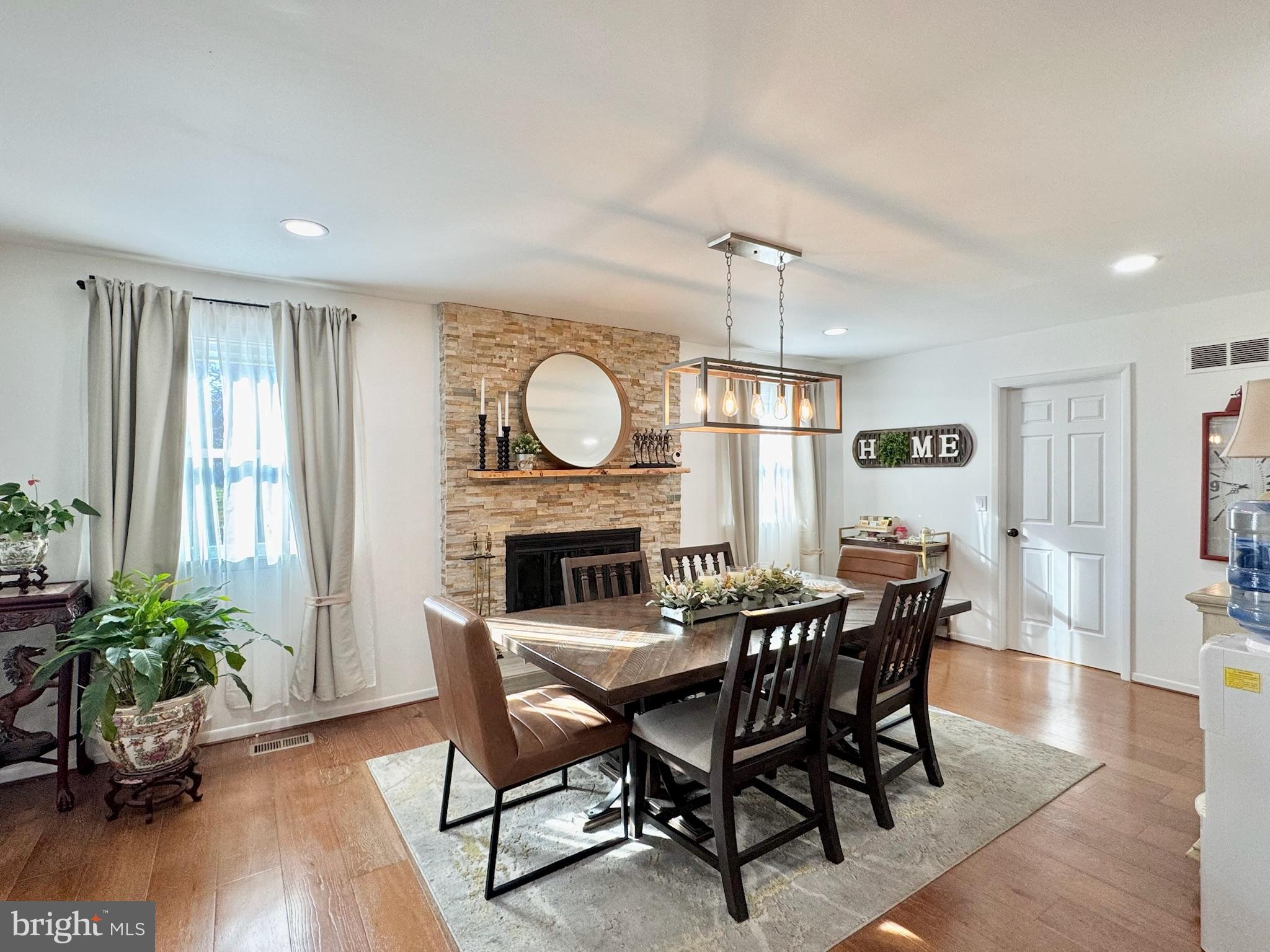 7397 New Cut Road Kingsville, MD 21087 - Photo 16 of 42 a view of a dining room with furniture window and wooden floor
