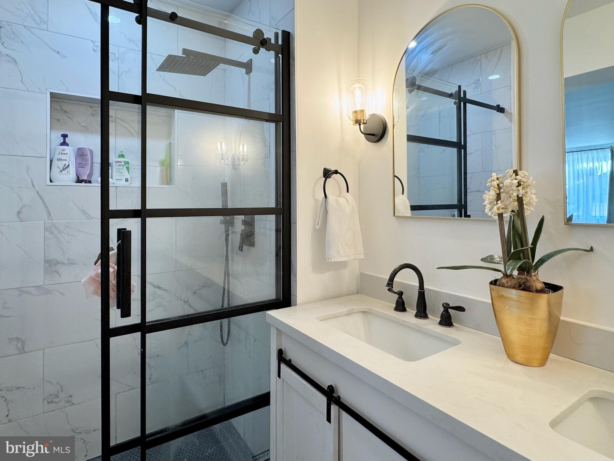 7397 New Cut Road Kingsville, MD 21087 - Photo 21 of 42 a bathroom with a sink and mirror