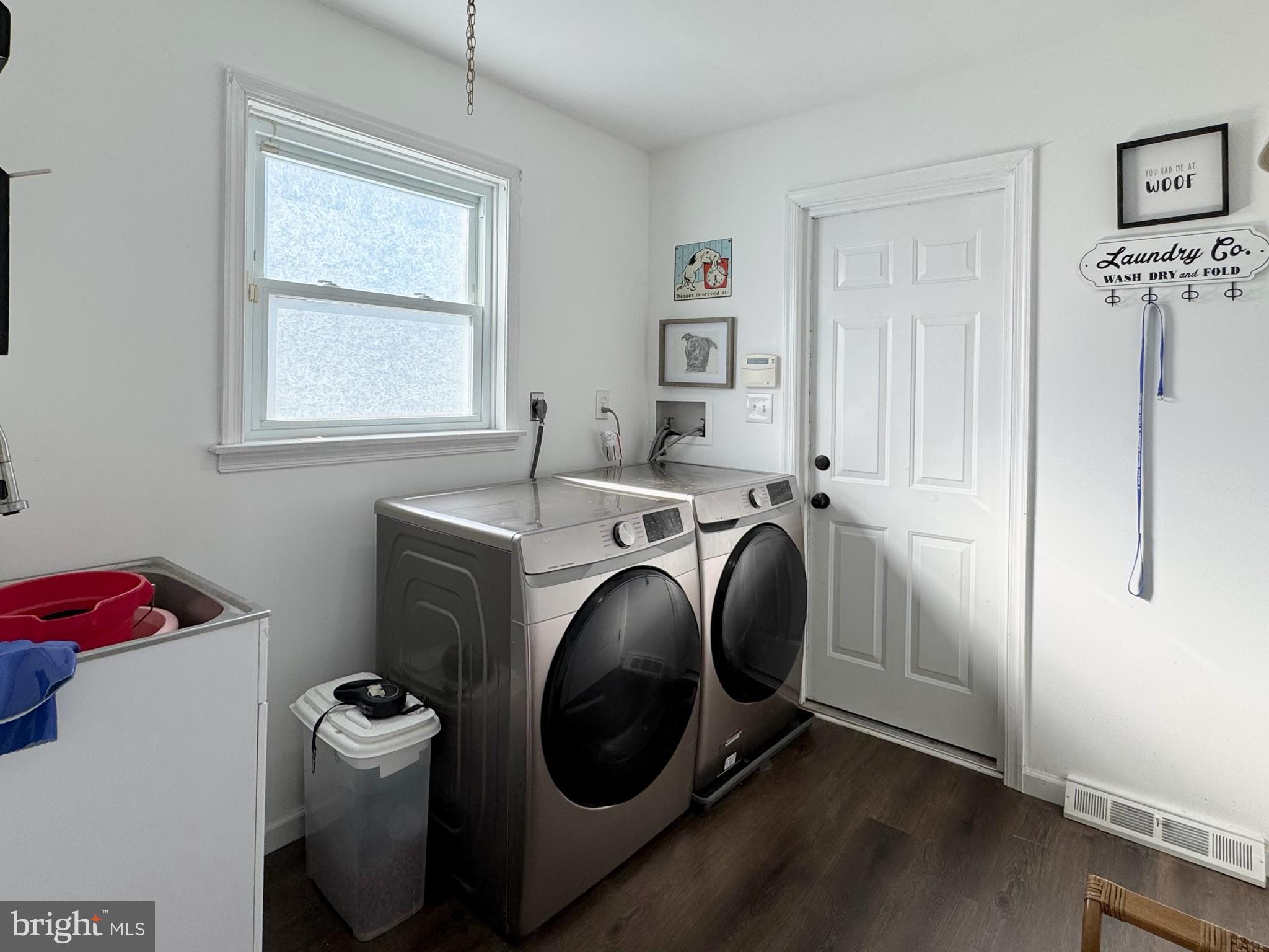 7397 New Cut Road Kingsville, MD 21087 - Photo 29 of 42 a utility room with dryer washer and a window