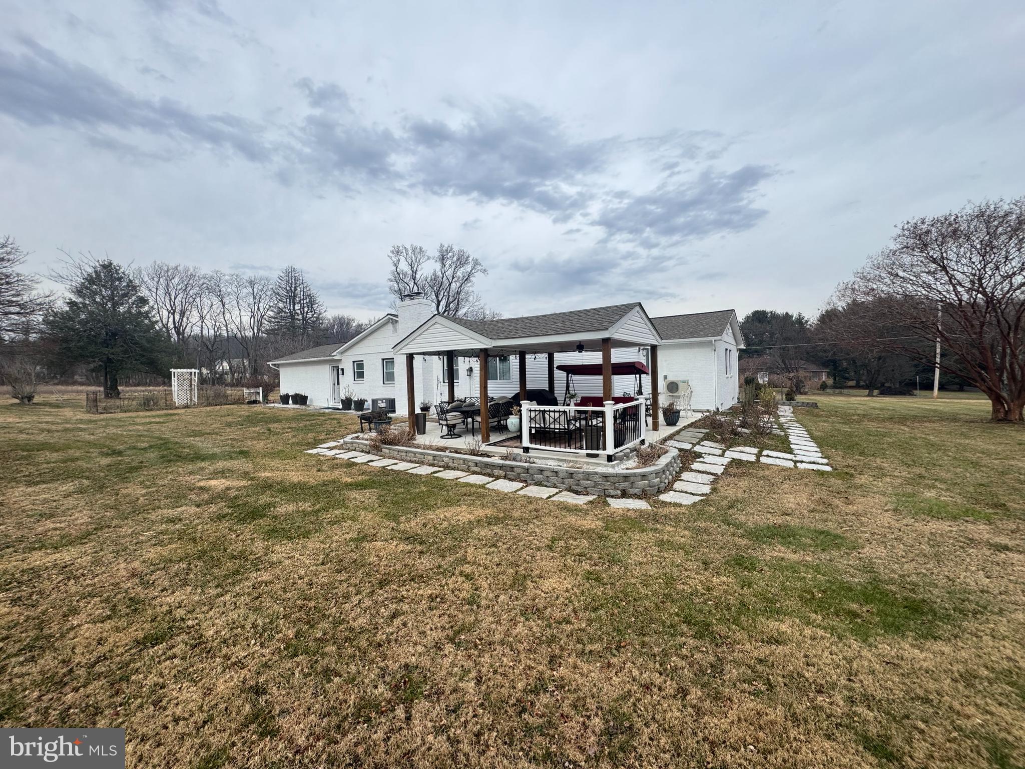 7397 New Cut Road Kingsville, MD 21087 - Photo 35 of 42 a view of a house with a big yard and large trees