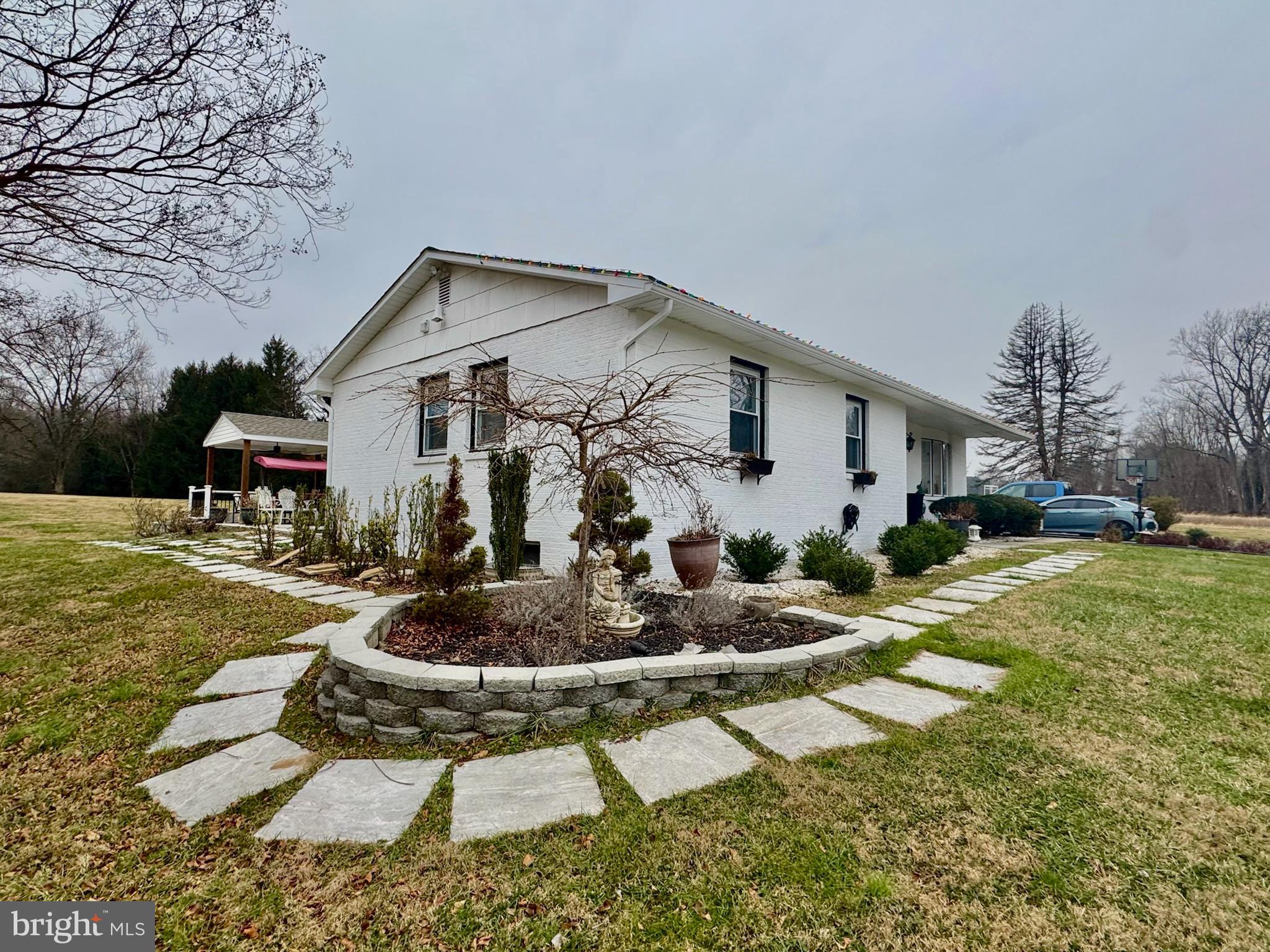7397 New Cut Road Kingsville, MD 21087 - Photo 5 of 42 a front view of a house with garden