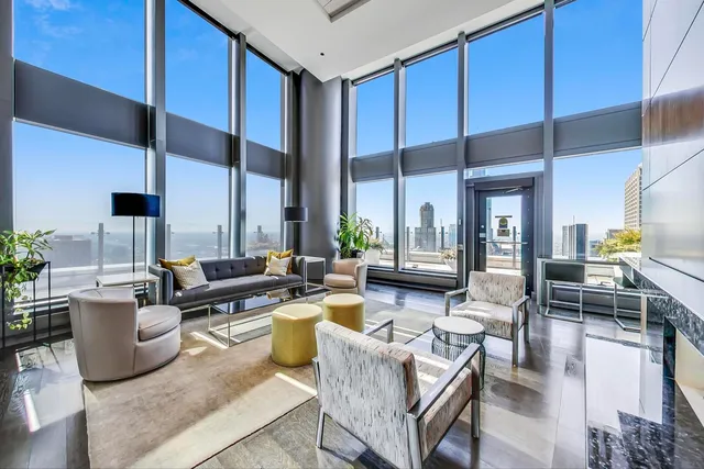 a view of a city with tall buildings