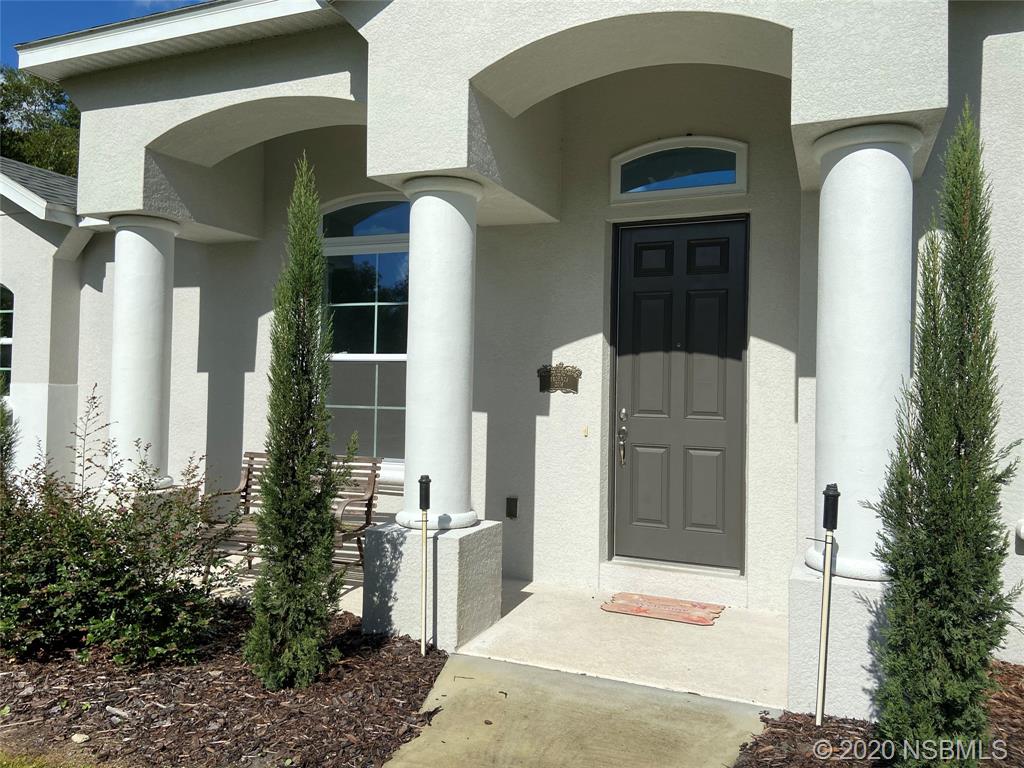 1900 Marsh Road DeLand, FL 32724 - Photo 2 of 39 a building with a outdoor space