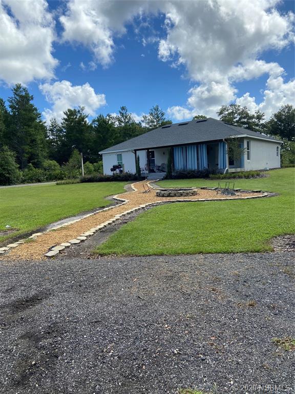 1900 Marsh Road DeLand, FL 32724 - Photo 11 of 39 a view of a house with a yard