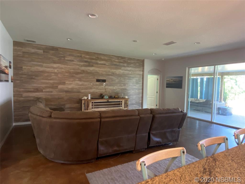 1900 Marsh Road DeLand, FL 32724 - Photo 15 of 39 a living room with furniture and wooden floor