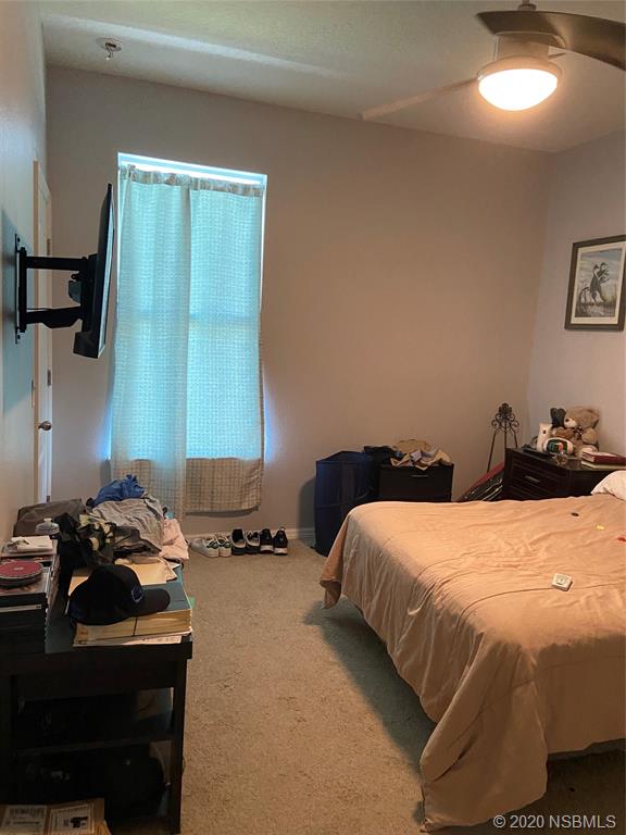 1900 Marsh Road DeLand, FL 32724 - Photo 22 of 39 a bedroom with a bed and a window