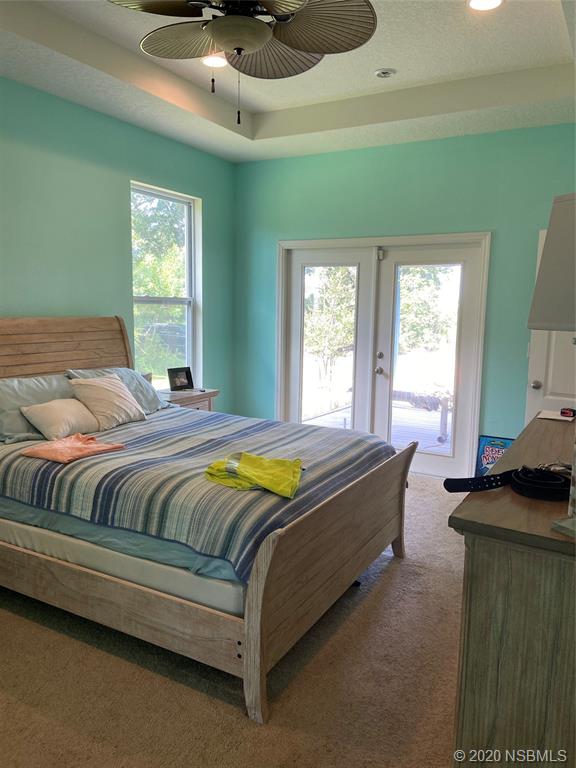 1900 Marsh Road DeLand, FL 32724 - Photo 25 of 39 a bedroom with a bed and window