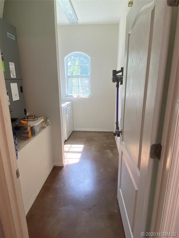 1900 Marsh Road DeLand, FL 32724 - Photo 29 of 39 a view of a kitchen from a hallway