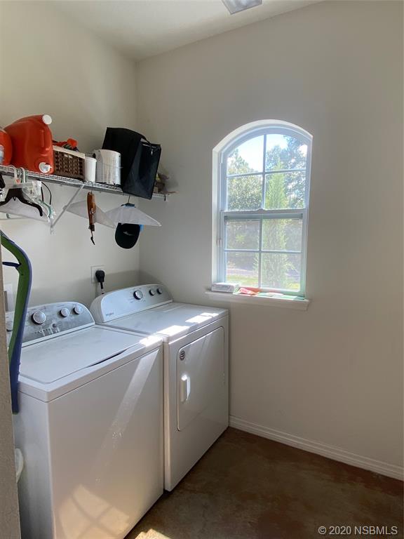 1900 Marsh Road DeLand, FL 32724 - Photo 30 of 39 a utility room with dryer and washer