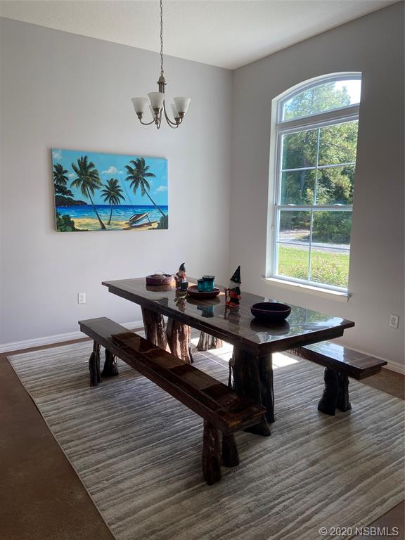 1900 Marsh Road DeLand, FL 32724 - Photo 9 of 39 a view of a livingroom with furniture and a window