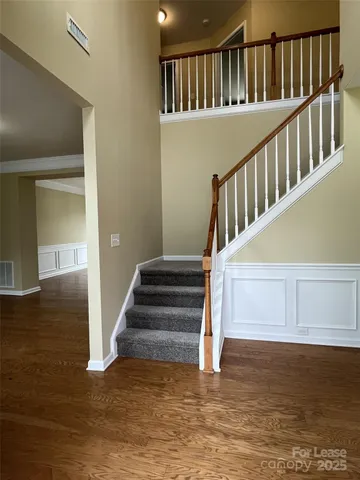 a view of entryway with wooden floor