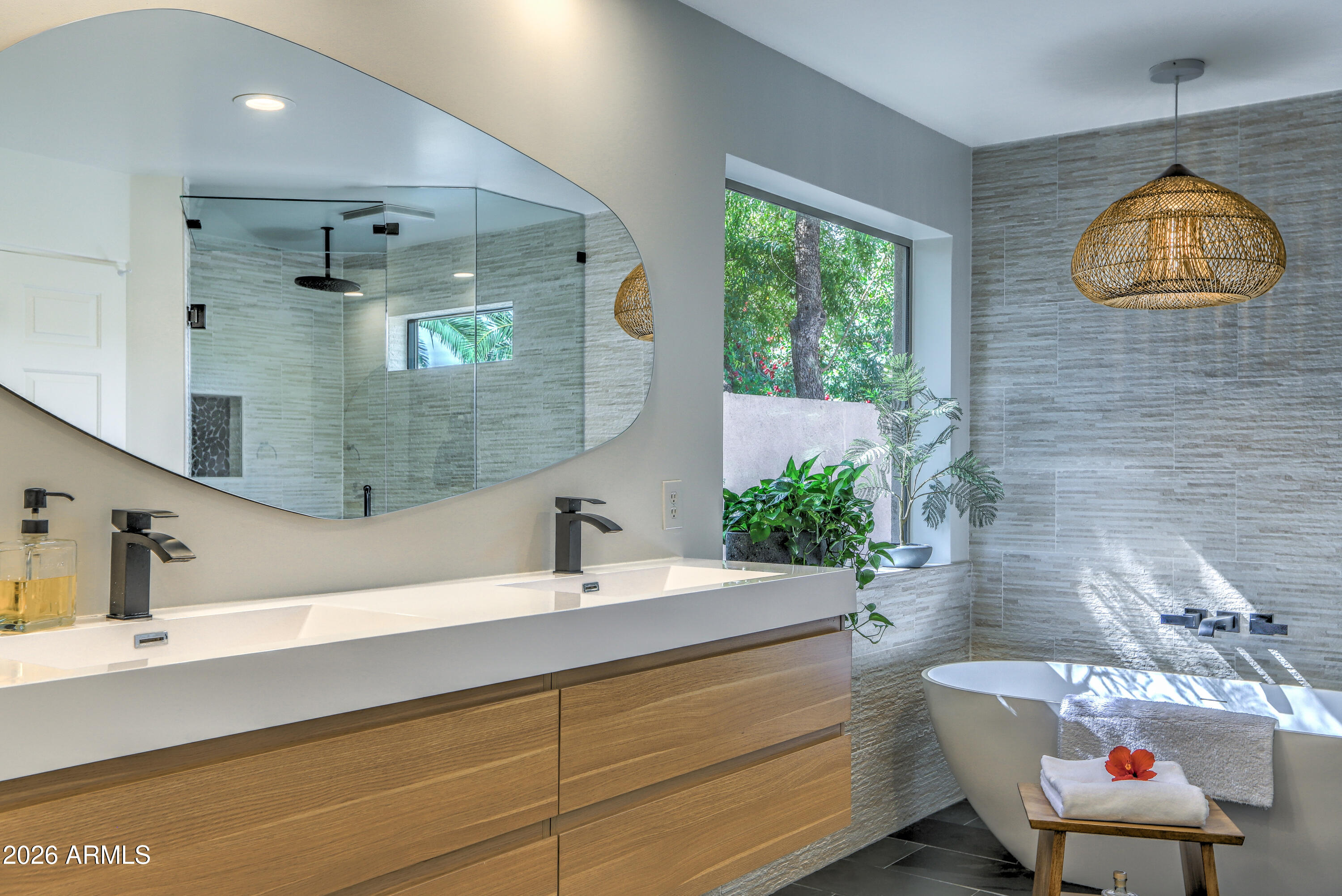 7414 East Corrine Road Scottsdale, AZ 85260 - Photo 45 of 67 a bathroom with a sink and a mirror