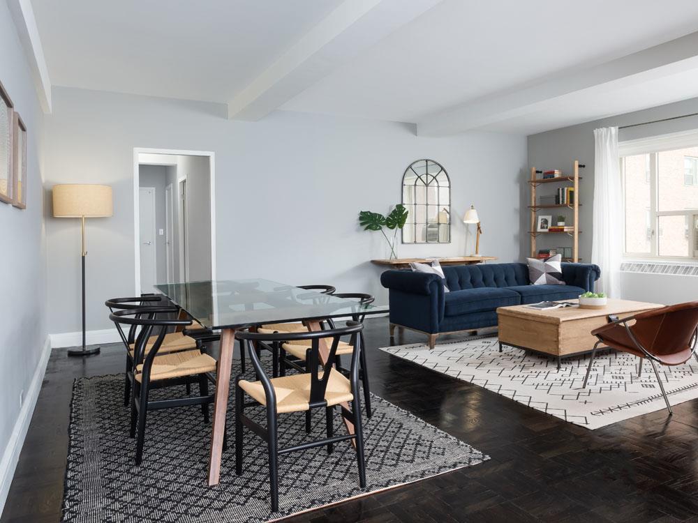 8 Peter Cooper Road, Unit 1A Manhattan, NY 10010 - Photo 1 of 10 a living room with furniture and a window