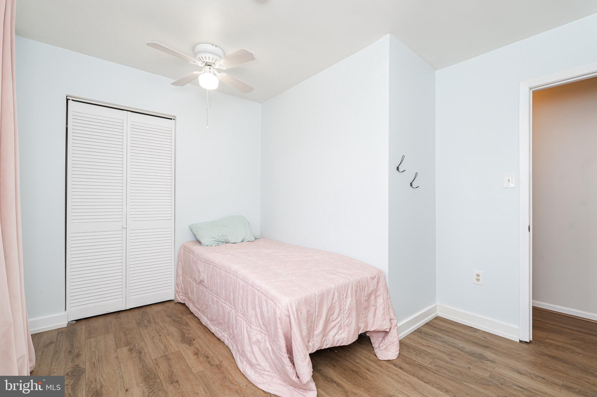 1414 Kitchens Orchard Falling Waters, WV 25419 - Photo 46 of 55 a bedroom with a bed and a ceiling fan