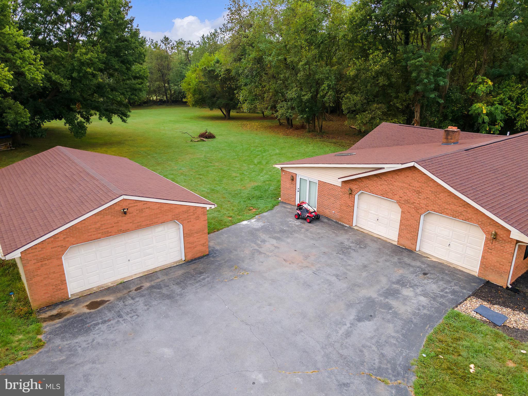 1414 Kitchens Orchard Falling Waters, WV 25419 - Photo 5 of 55 an aerial view of a house with a yard
