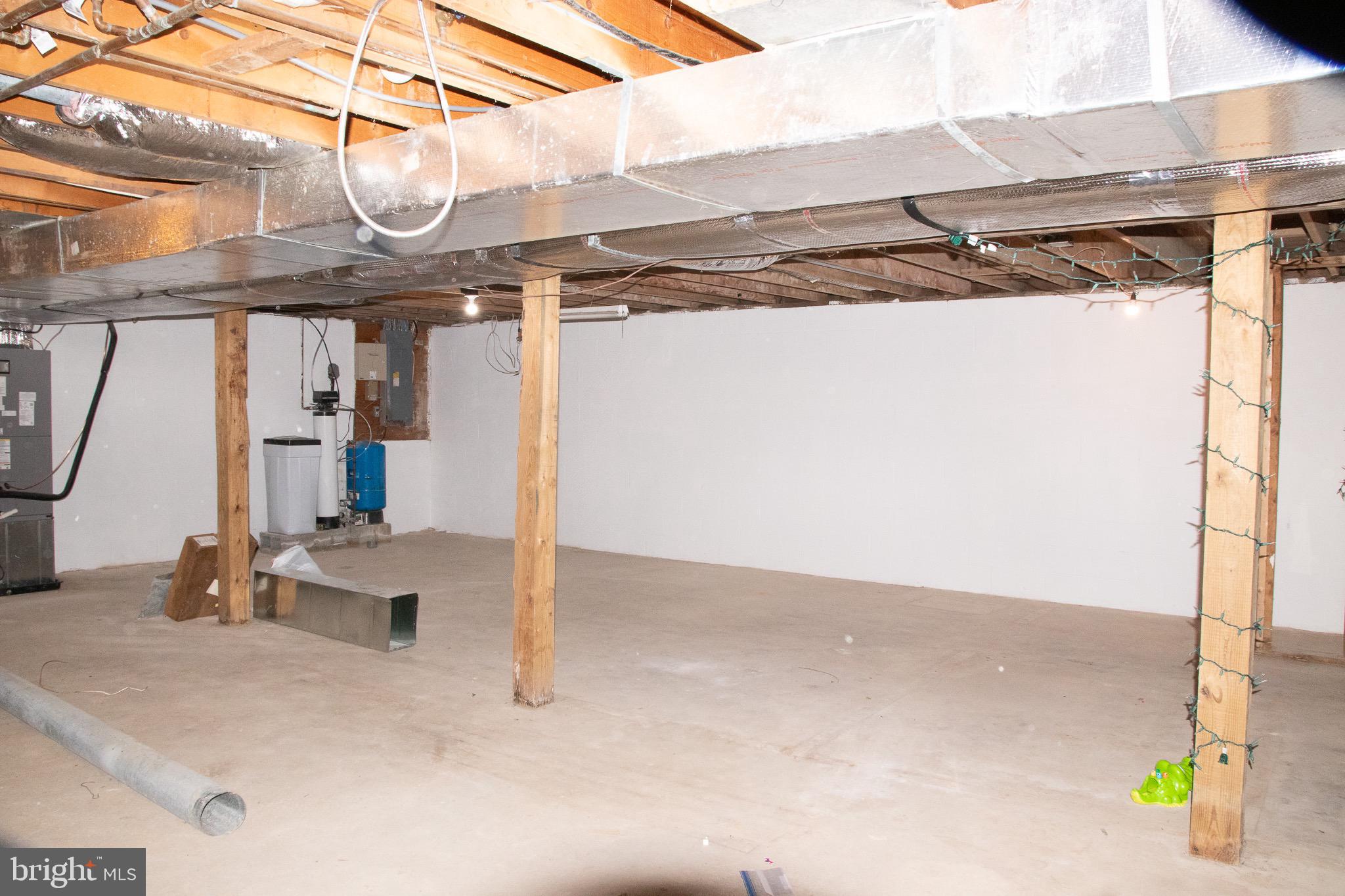 1414 Kitchens Orchard Falling Waters, WV 25419 - Photo 55 of 55 a view of a room with wooden floor