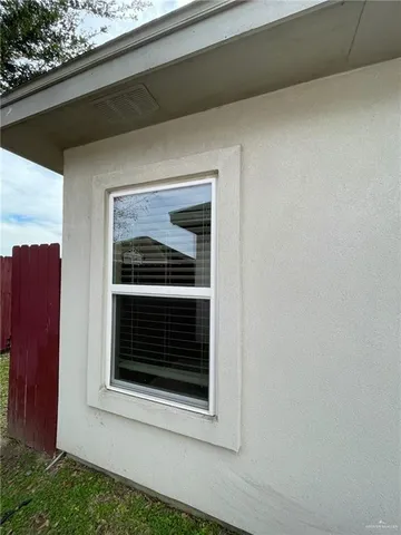 a utility room with a sink a washer and dryer