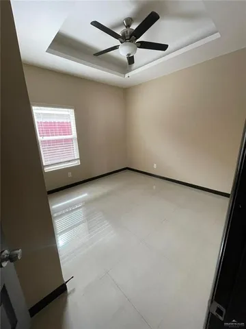 a kitchen with stainless steel appliances granite countertop a stove a refrigerator a sink and dishwasher