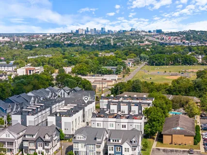 an aerial view of a city with lots of residential buildings