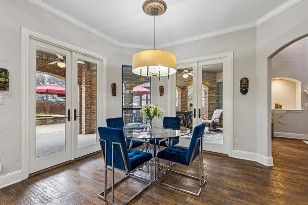 a kitchen with stainless steel appliances a refrigerator sink and cabinets