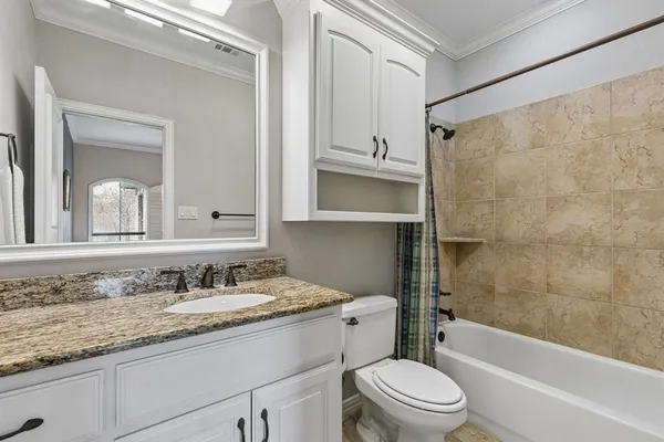 a bathroom with a sink and a bathtub