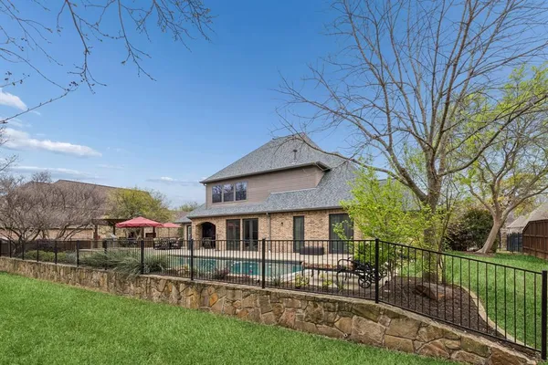 a view of outdoor space with swimming pool and patio