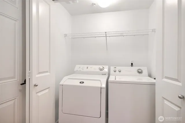 a utility room with dryer and washer