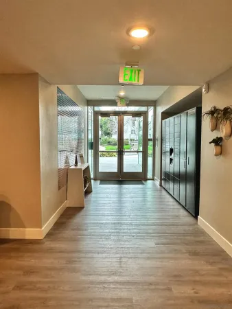 a lobby with furniture and window