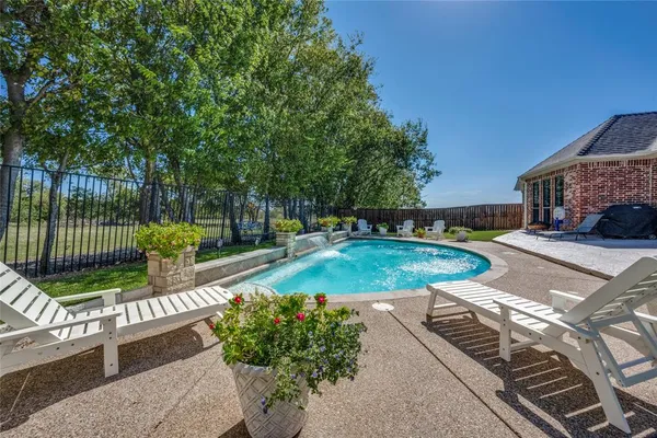 a view of a backyard with a garden