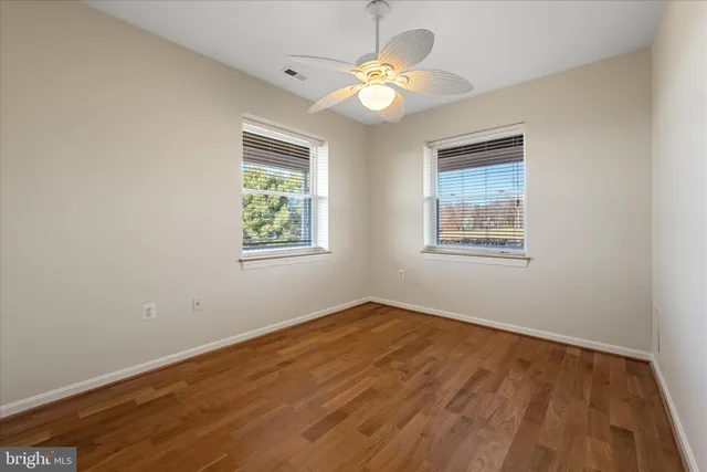 a aerial view of a house with a yard