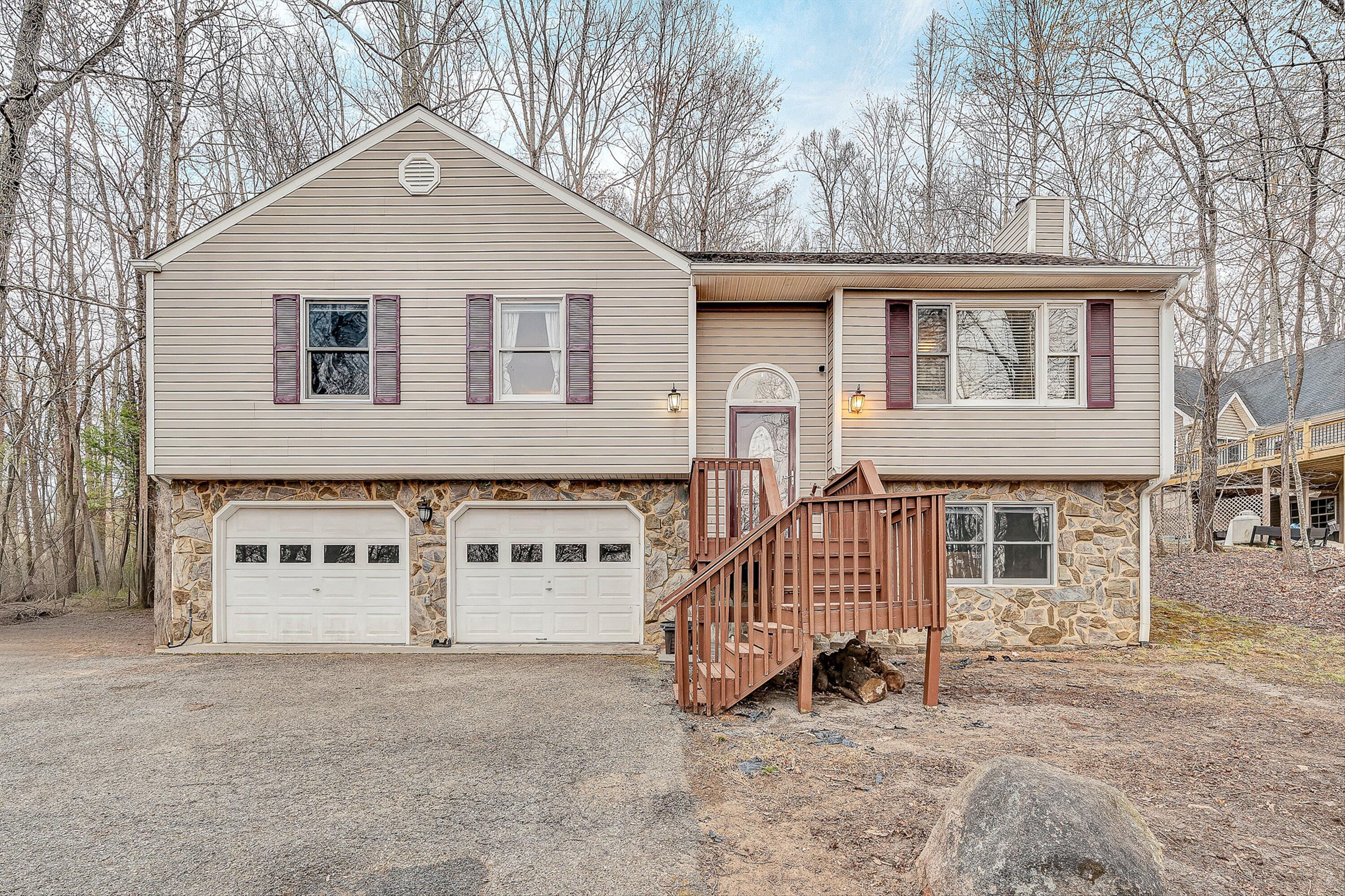 769 Lakeshore Terrace Road Hardy, VA 24101 - Photo 1 of 38 front view of a house with a yard