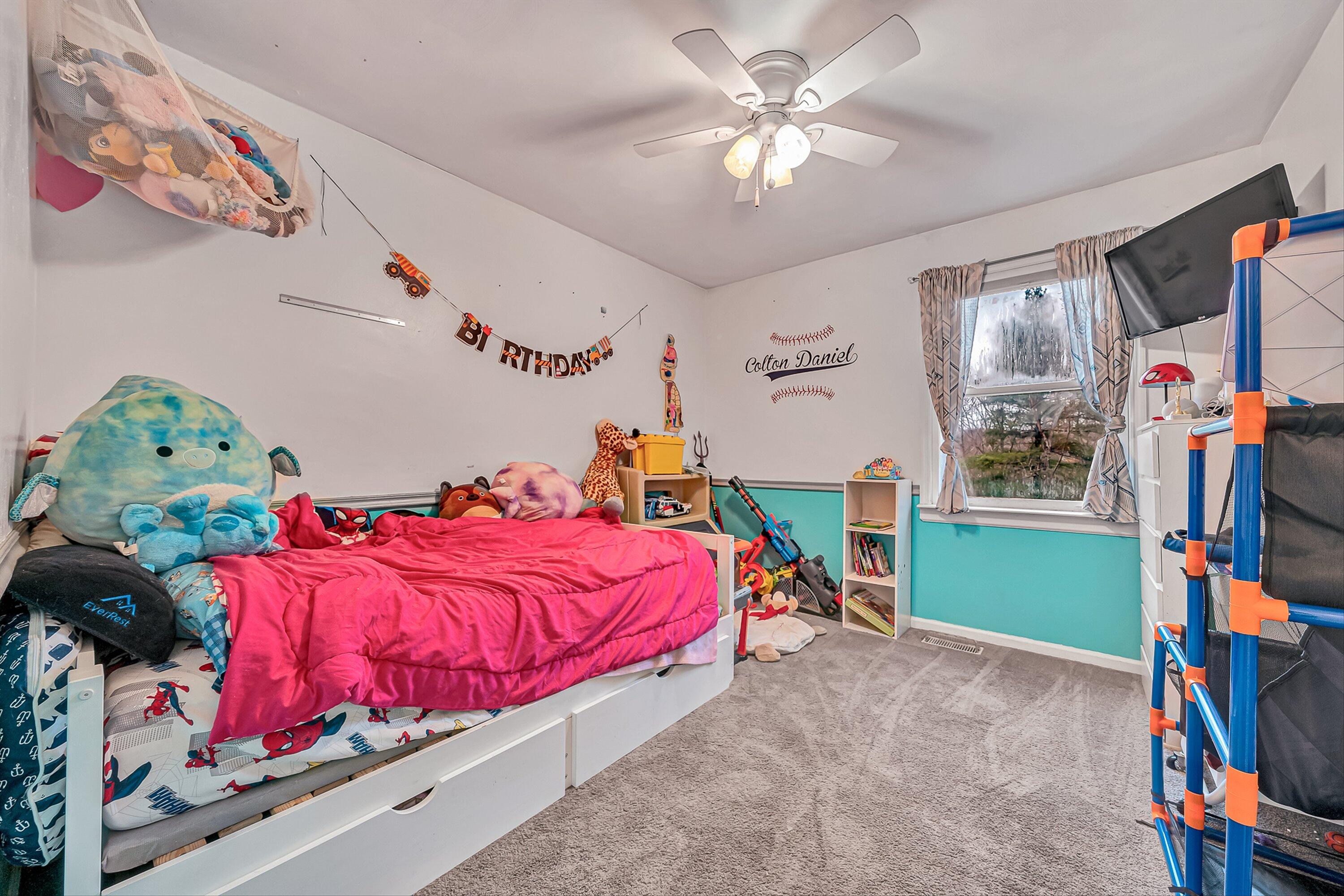 769 Lakeshore Terrace Road Hardy, VA 24101 - Photo 19 of 38 a bedroom with a bed and a tv